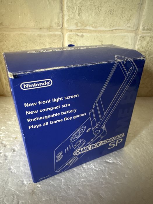 Konsola Nintendo Game Boy Advance SP - niebieska, w pudełku z ładowarką, grą i instrukcją