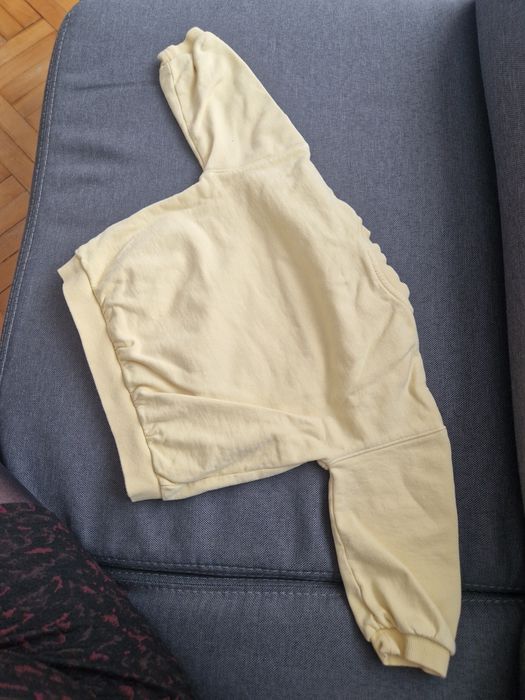 Żółta bluza wkładana przez głowę h&m pluto