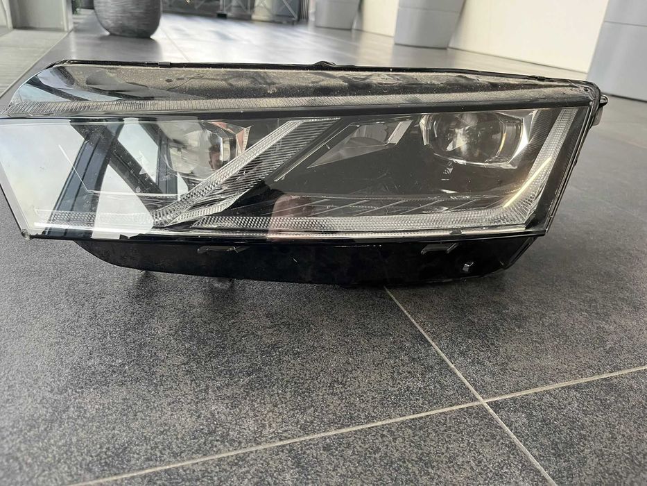 Lampa reflektor Skoda Octavia IV Lewa