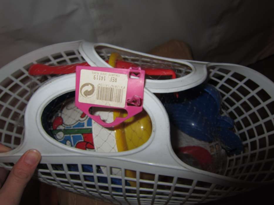 Beach toy set in a white basket with bucket, shovel, rake, etc.64751300347779121