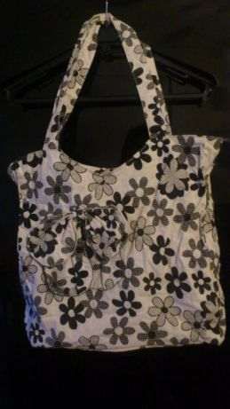 Floral-print fabric suitcase