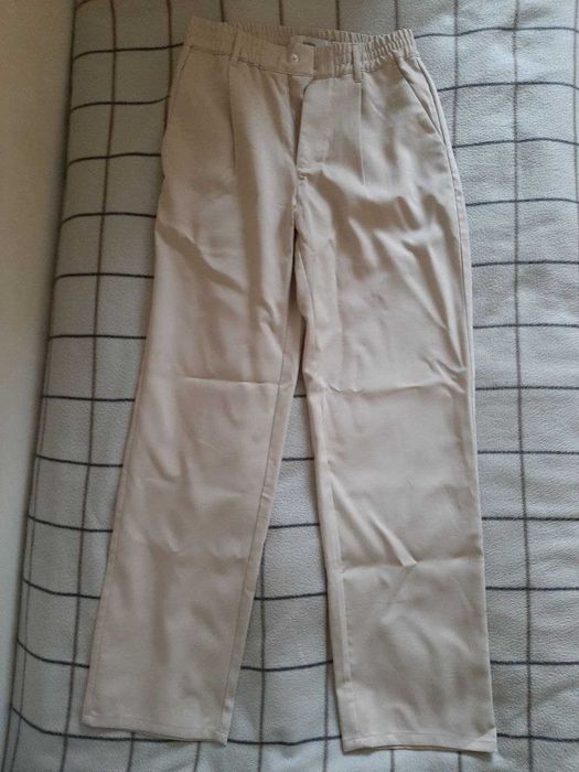 BERSHKA Spodnie męskie tailoring z zakładkami