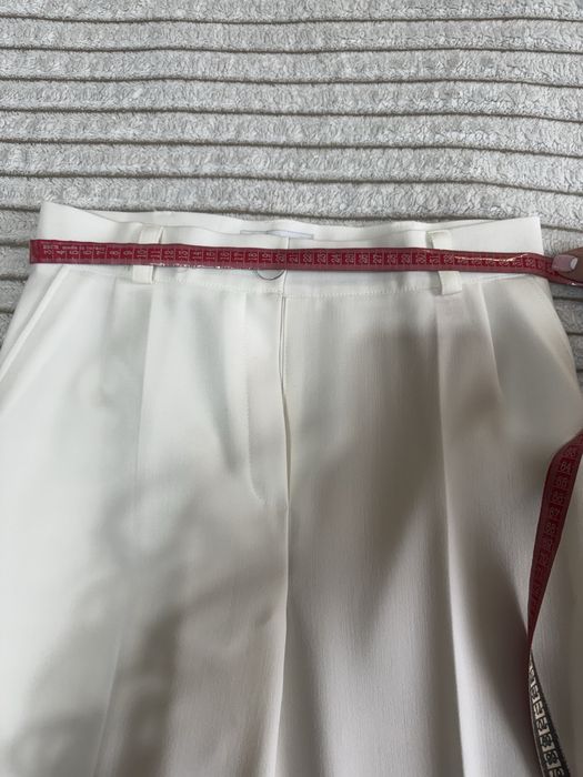 Елегантний жіночий костюм молочного кольору (піджак + штани)