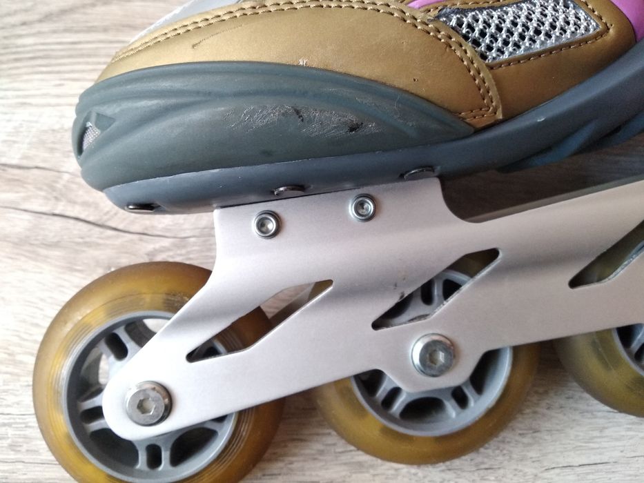 Роликовые коньки