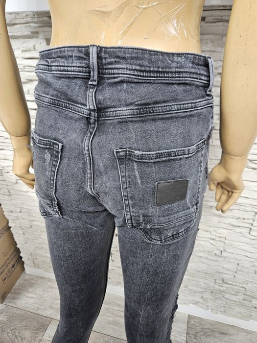Super modne spodnie jeansowe damskie czarne Zara rozmiar 42 z przetarc