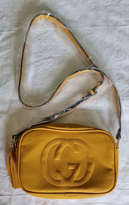Bolsa de senhora em pele amarela NOVA (sem uso)