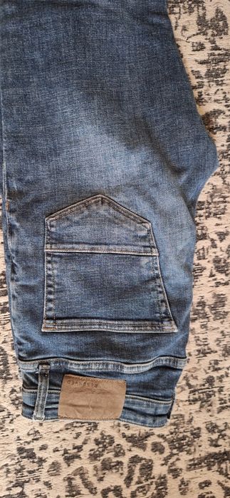 Jeansy slim z efektem sprawia 31/32