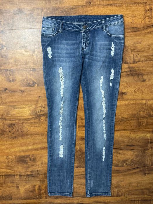 Spodnie jeansowe z dziurami rozdarciami jeansy Sparkz W28 L32 S