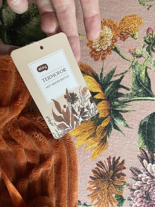 Nowy z metką termofor Eloy / pluszowy nowy termofor z pomponikamk