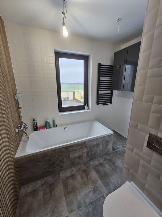 budowa domów pod klucz remonty adaptacje elewacje dachy ogrody koparka