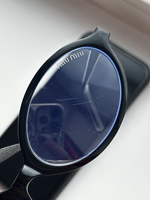Оригінальні окуляри Miu Miu SMU04Z чорна овальна оправа Італія