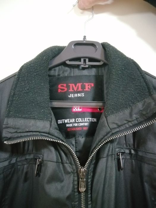 Blusão preto da SMF