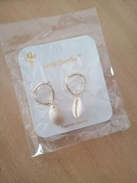 Brincos de senhora novos