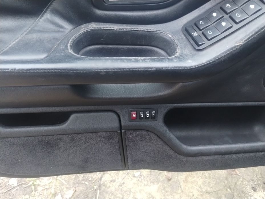 BMW e38 boczki drzwi skóra szyte rączki komplet