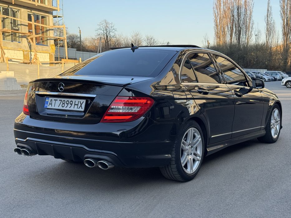 Mercedes-Benz C-Class 2014 VIN WDDGF8AB9EA945872 фото оголошення 4 з 19