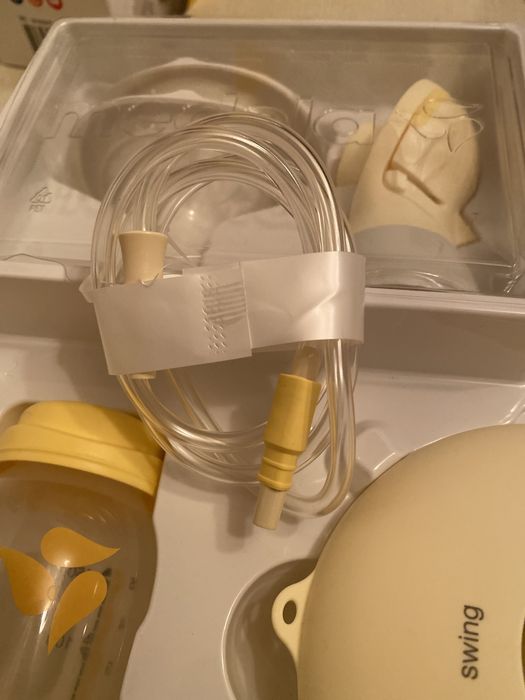 Електронный молокоотсос medela