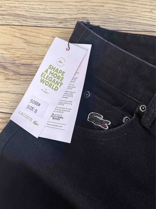 Штани/джинси Lacoste/лакоста