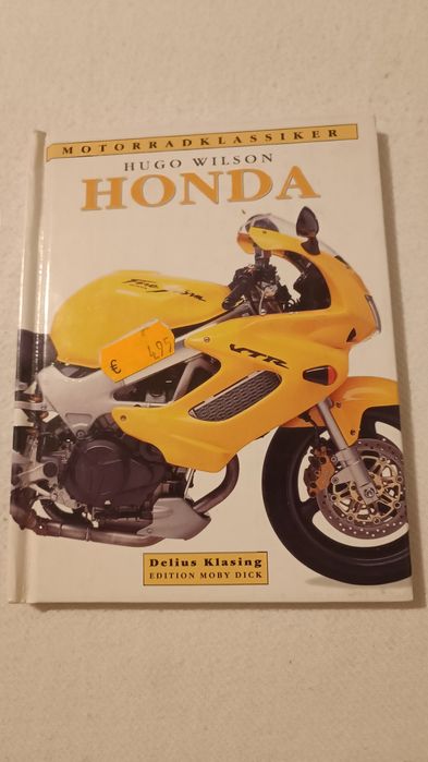 Книга  о мотоцикле Honda Новая