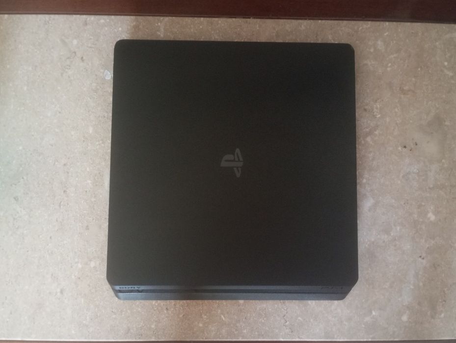 PS4 Slim 500GB | New Controller + GTA V | Like New - €20064584271737474121