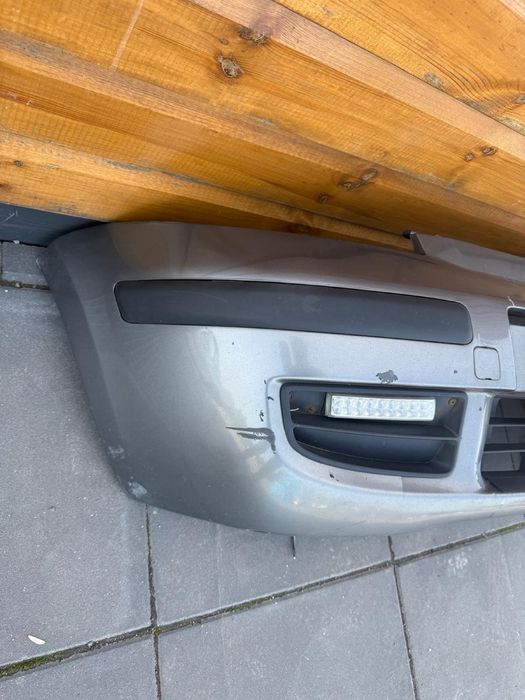 Fiat Panda 2 II zderzak przedni przód 695