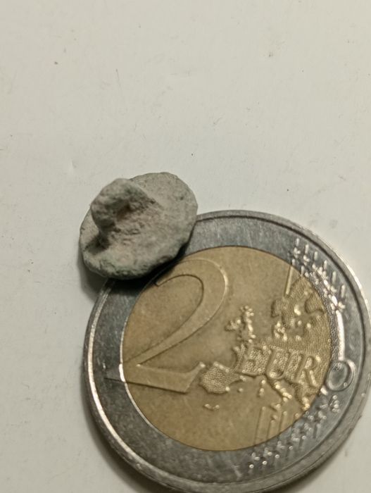 Botão antigo em Metal