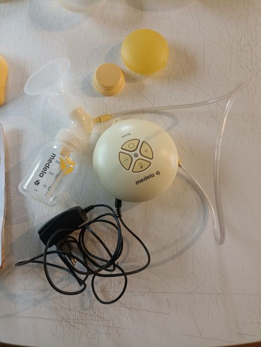 Bomba elétrica medela, bomba manual Chico e um copo coletor