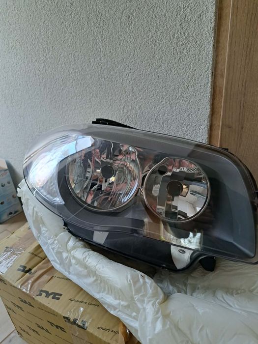 NOWE Reflektory BMW E87 E81 + ślizgi reflektorów