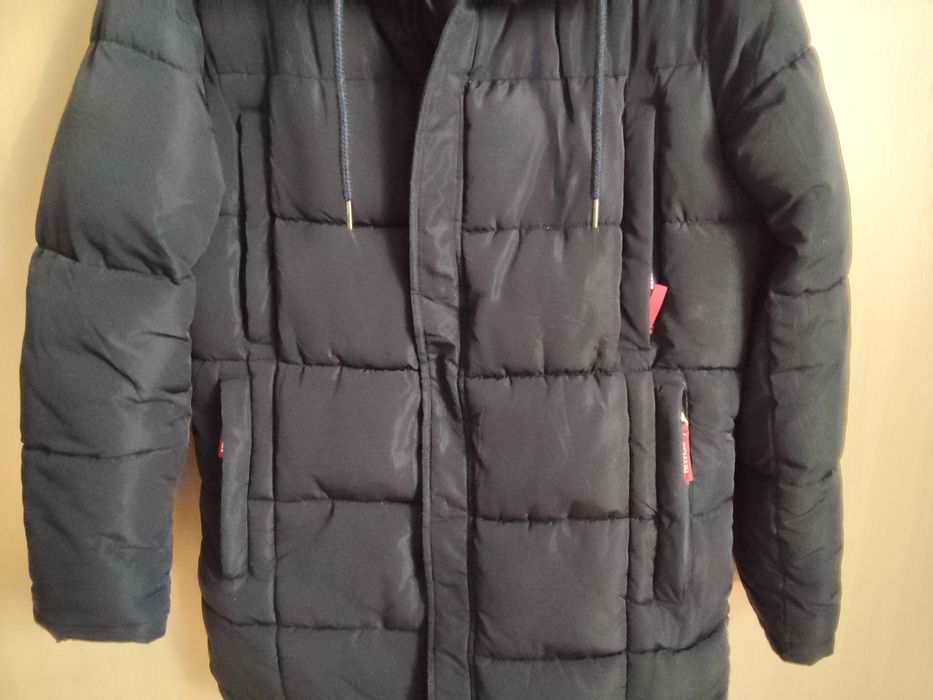 Очень удобная теплая зимняя мужская куртка тепла зимова