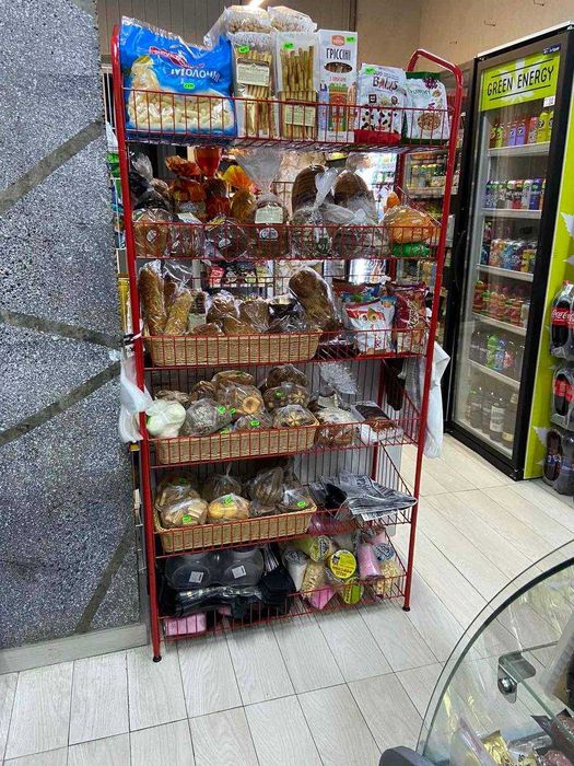 Стелаж металевий з сітчастими полицями  для товарів