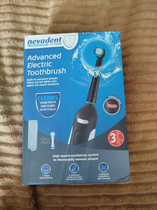 Зубна електрощітка