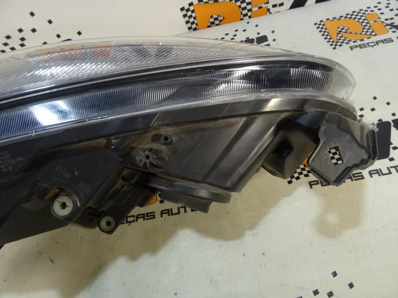 Ótica / farol esquerda OPEL Astra J
