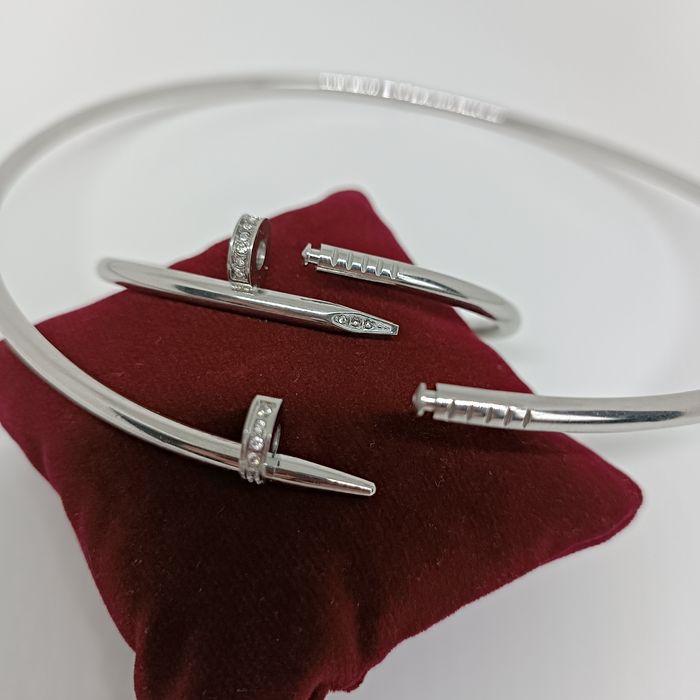 Набір прикрас жіночий: жорсткий чокер і браслет цвях  з цирконіями