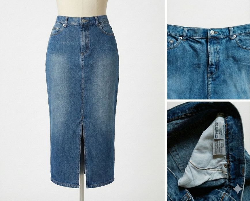 Синя джинсова спідниця міді з розрізом, розмір 46-48.
100% котон, замі