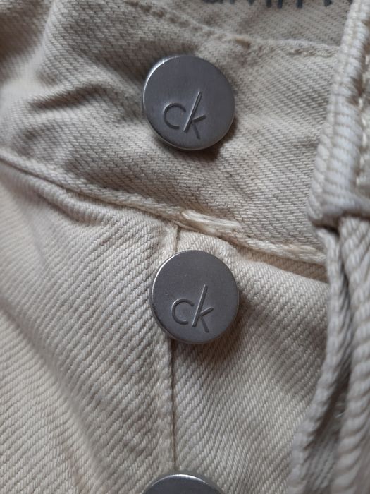 Jeansy beżowe Calvin Klein