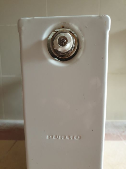 Grzejnik stalowy panelowy boczny  PURMO 600 × 1100 biały