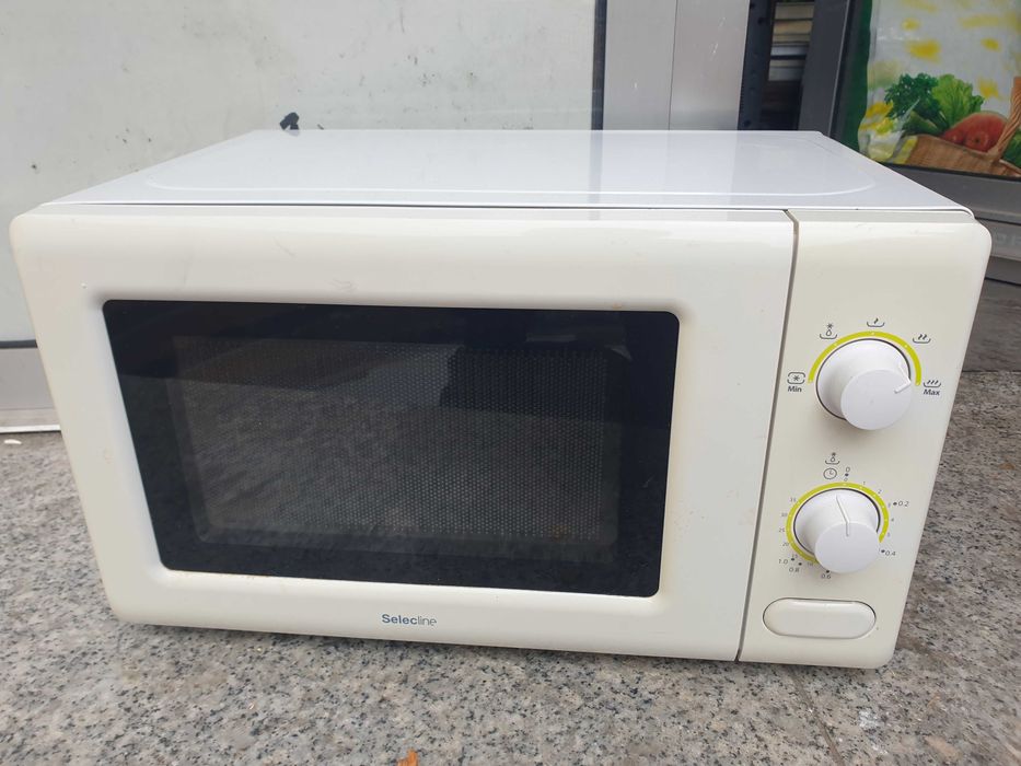 Microondas Slecline a funcionar muito bem.