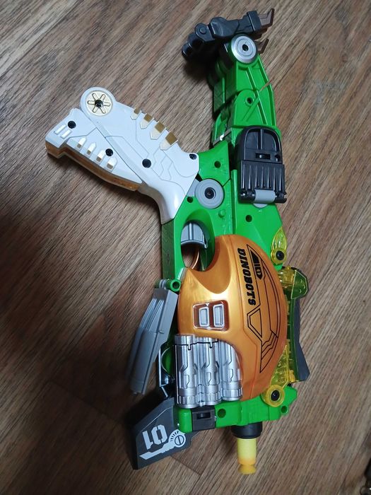 Динобот-трансформер Dinobots Стегозавр 2 в одном бластер