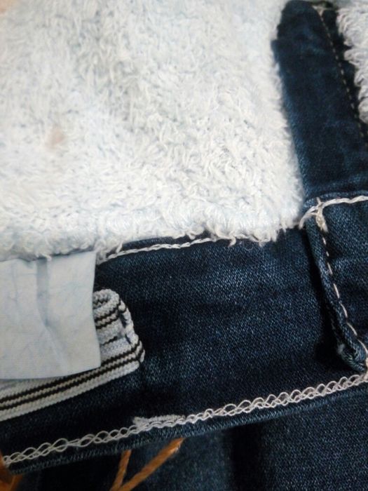 Джинсы на  травке новые