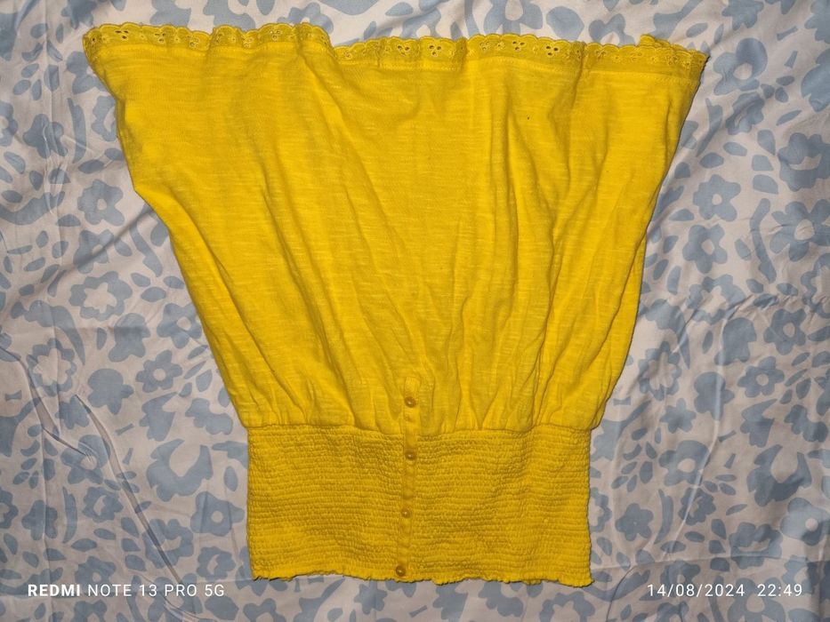 Top tomara que caia amarelo.