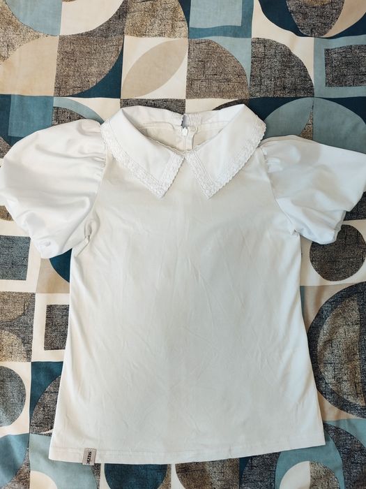 Біла блузка для дівчинки
