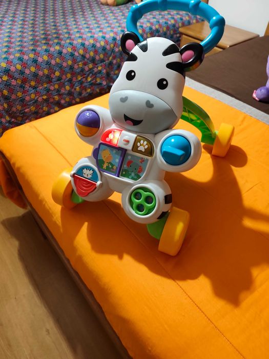 Andador fisher price zebra