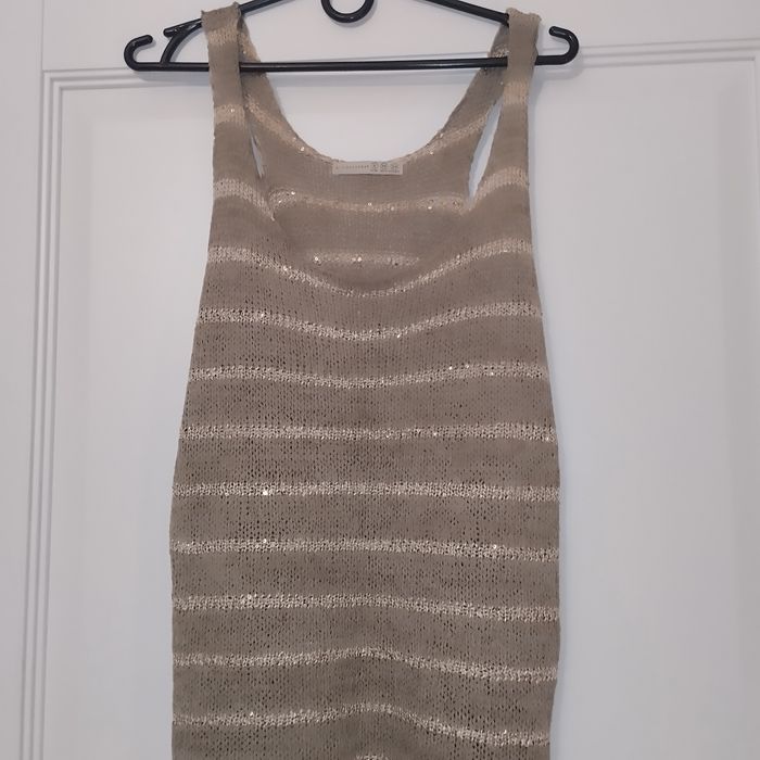 Złota kamizelka sweterkow a Atmosphere