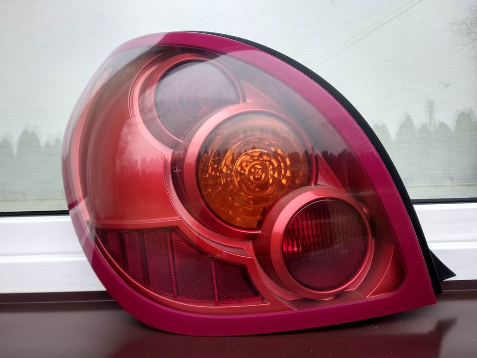 Nissan Almera N16 LIFT FL lampa tył tylna lewa wkład oprawka oryginał