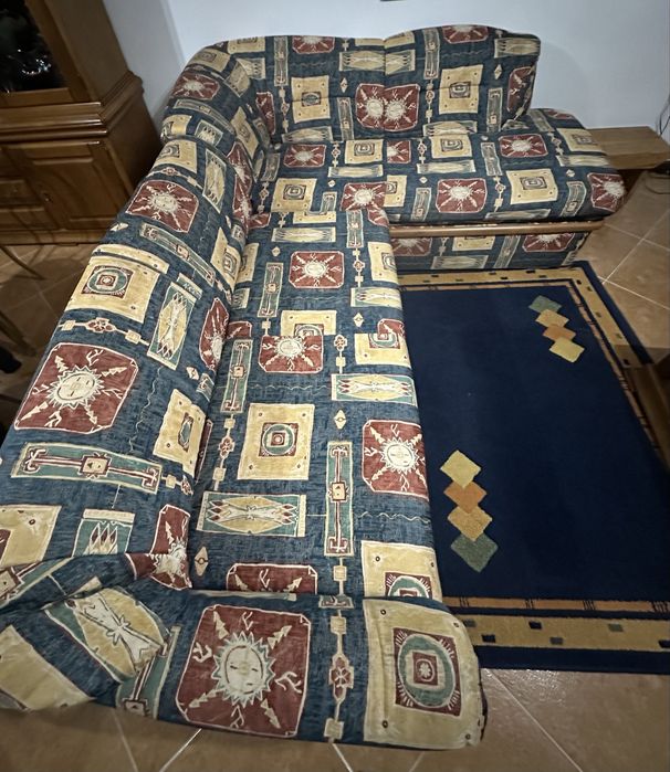 Sofá de canto com cama e arrumação + Poltrona