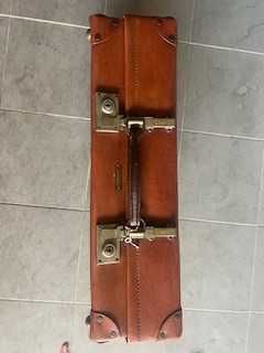 Mala de viagem antiga Revelation nova