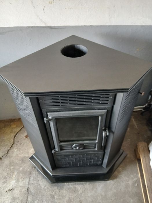 Vendo salamandra a lenha, de canto, ventilada. Marca Solzaima. Como nova.