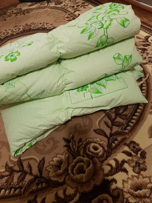 Пухова перина нова
