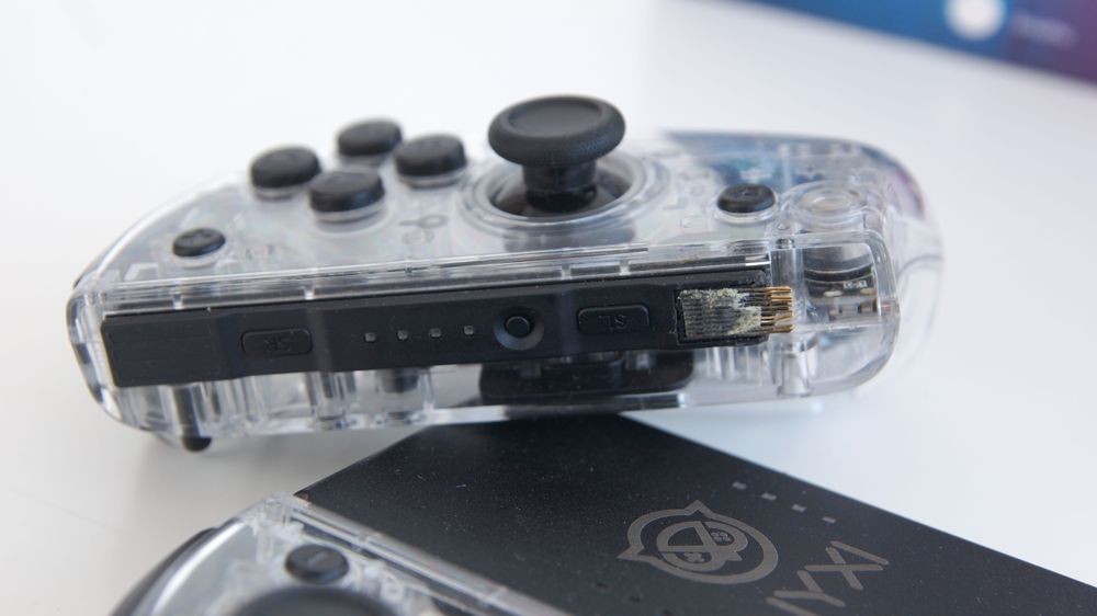 NYXI Hyperion Transparent do Nintendo Switch OLED – uszkodzone złącze