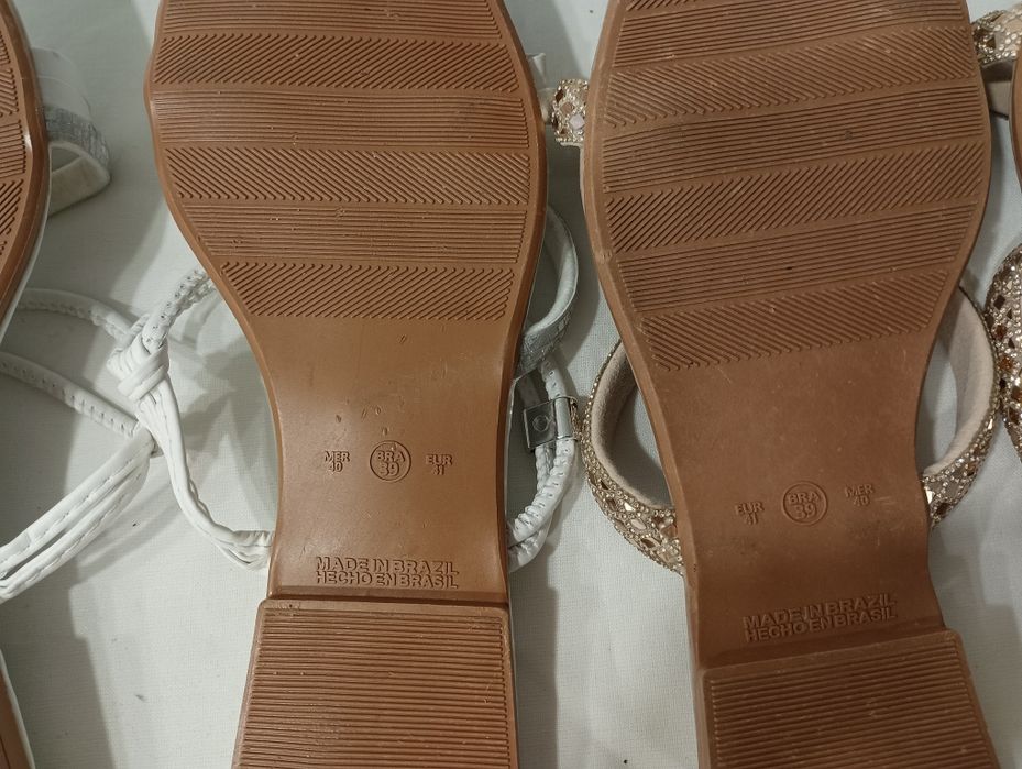 Selling nearly new flip-flops. Worn only once. Both for $19.9964584412566402122