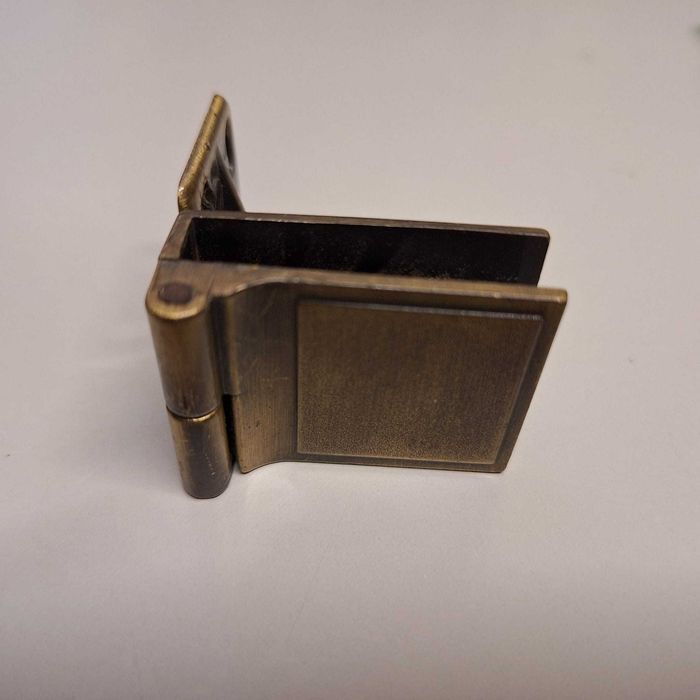 Dobradiça porta vidro (cada Un)